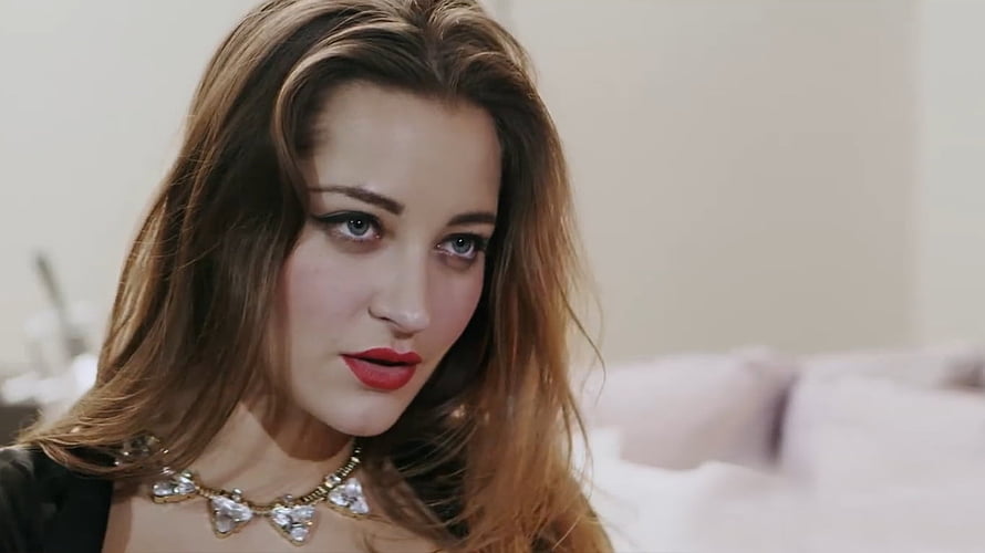Dani Daniels Close-Up Portrait with Red Lipstick and Crystal Necklace HD wallpaper
