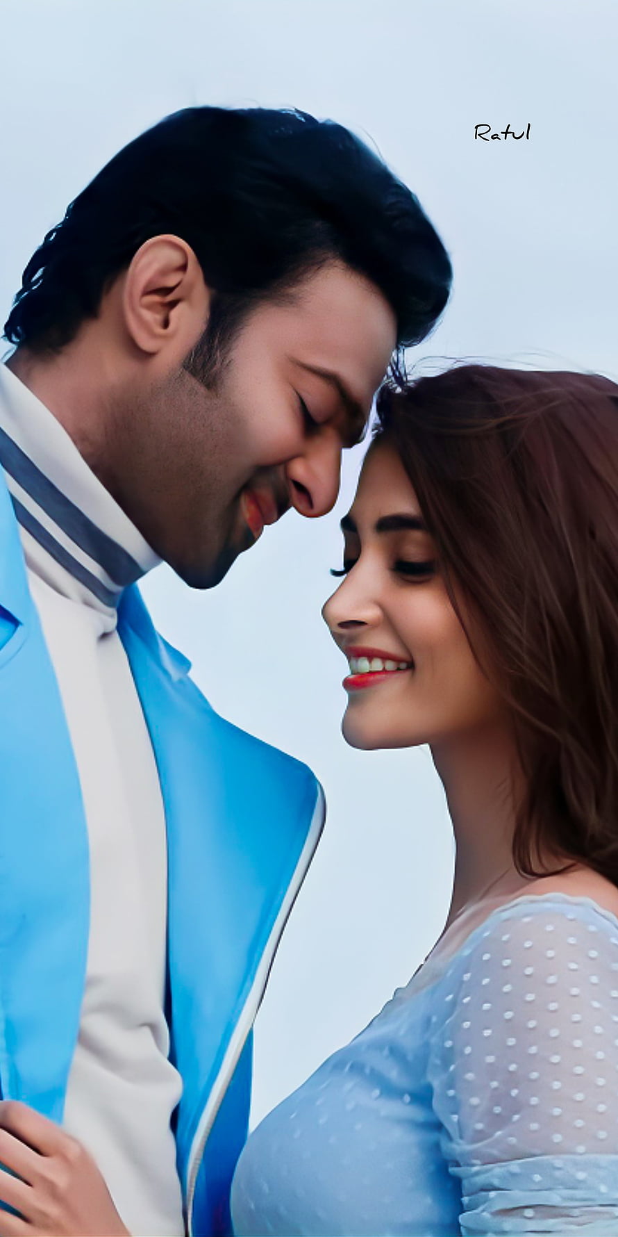 Prabhas and Pooja Hegde in a romantic close-up from the film Radhe Shyam HD phone wallpaper