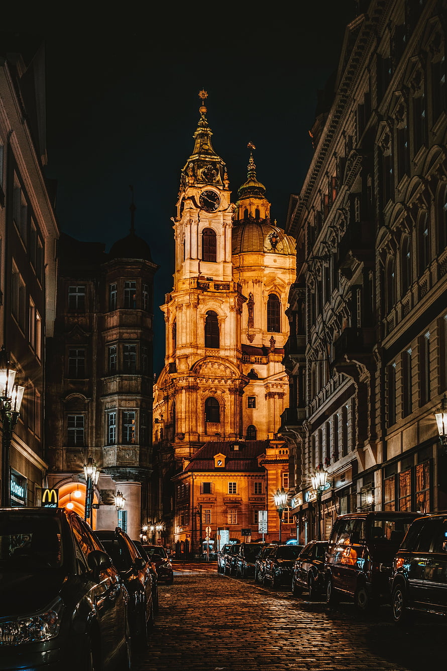Illuminated St Nicholas Church in Prague Old Town at Night HD phone wallpaper
