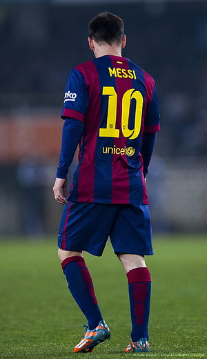 Lionel Messi in Barcelona Home Kit Walking on the Pitch HD phone wallpaper