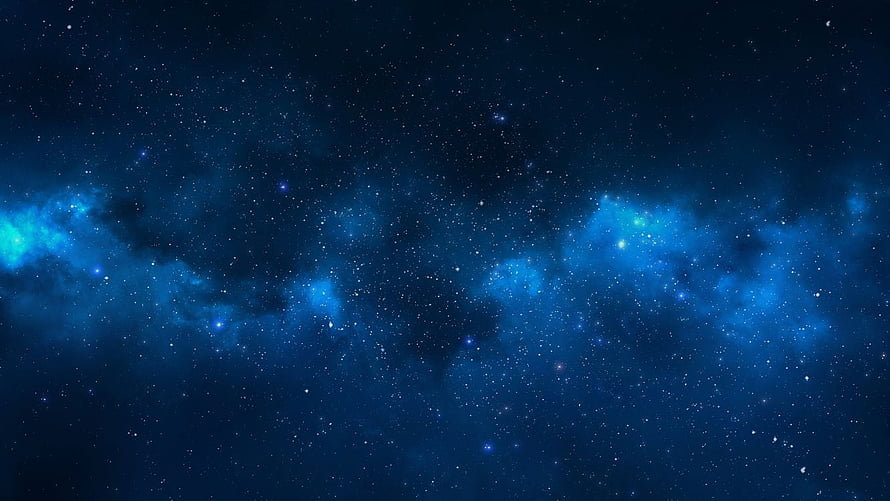 Vast Blue Starry Night Sky with Glowing Nebulae and Distant Stars HD wallpaper