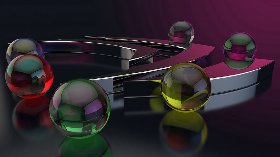 Colorful Glass Spheres and Metallic Rings on a Reflective Dark Surface HD wallpaper