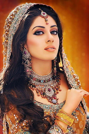 Elegant Indian Bride Portrait with Traditional Jewelry and Embroidered Bridal Lehenga HD phone wallpaper