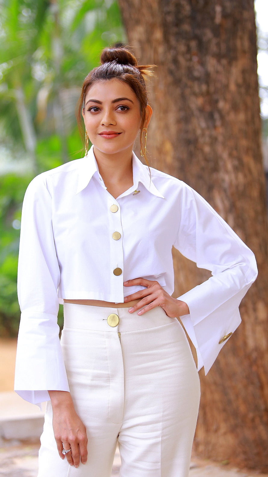 Kajal Agarwal in White Crop Top and High-Waisted Trousers HD phone wallpaper