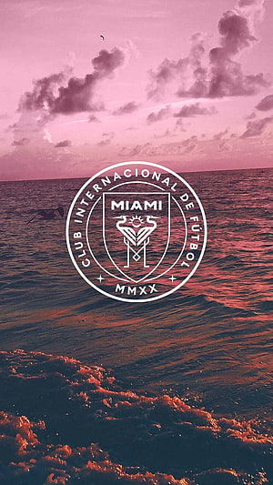 Inter Miami CF Crest Over Pink Ocean Sunset With Breaking Waves HD phone wallpaper