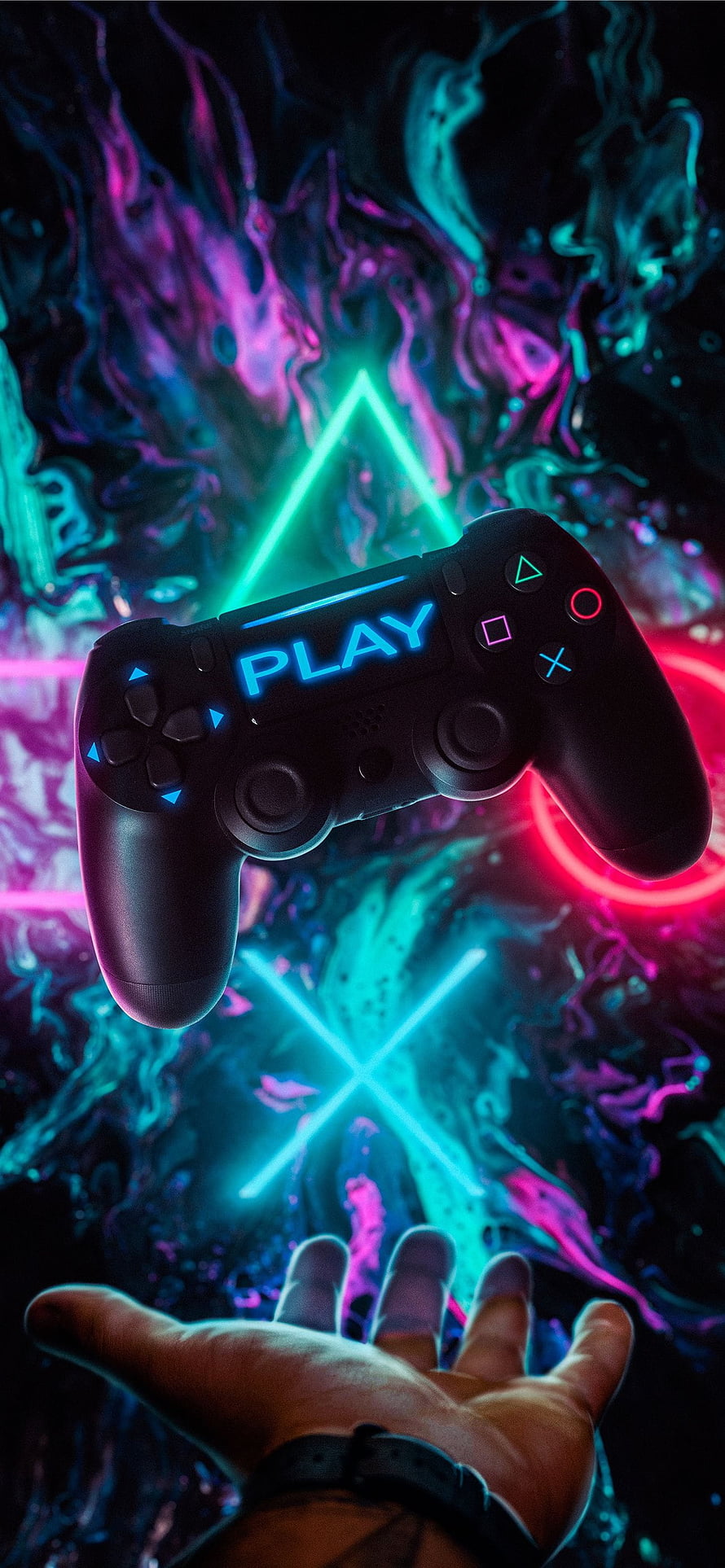 Neon PlayStation Controller Floating Above Open Hand with Vibrant Abstract Background HD phone wallpaper