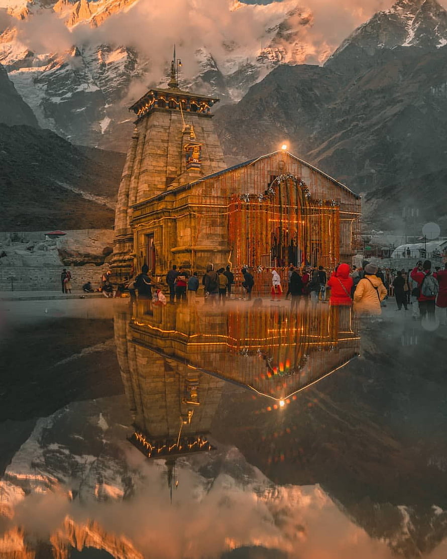 Kedarnath Temple at Golden Hour with Snow-Capped Himalayan Peaks and Water Reflection HD phone wallpaper