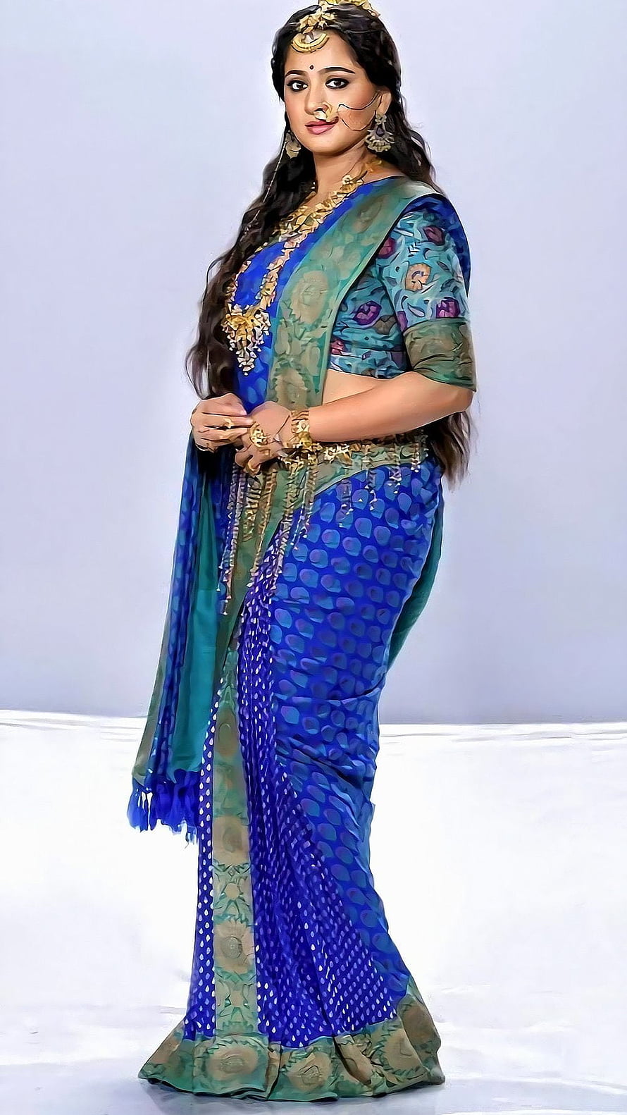 Anushka Shetty in a Royal Blue and Green Silk Saree with Traditional Gold Jewelry HD phone wallpaper