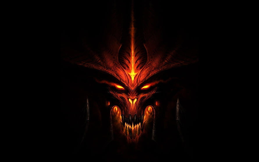 Fiery Demon Skull with Glowing Orange Eyes and Horns in Dark Fantasy Style HD wallpaper