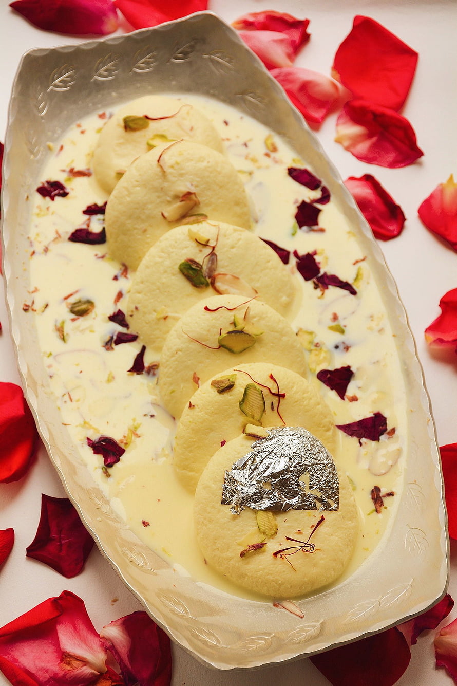 Traditional Indian Rasmalai Dessert with Rose Petals and Pistachios HD phone wallpaper