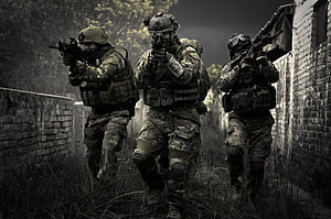 Three Tactical Operators in Full Combat Gear Moving Through a Narrow Alleyway HD wallpaper