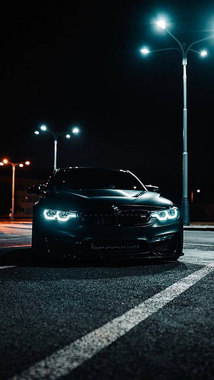 Matte Black BMW M4 Night Street Photography with Angel Eyes Headlights HD phone wallpaper