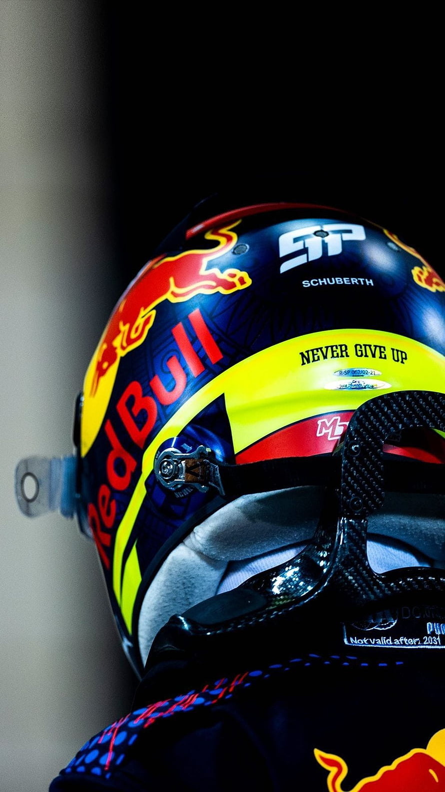 Sergio Perez Red Bull Racing F1 Helmet Close-Up with SchubertH Branding HD phone wallpaper