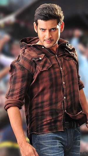 Mahesh Babu in a brown plaid shirt with a serious expression and short dark hair HD phone wallpaper