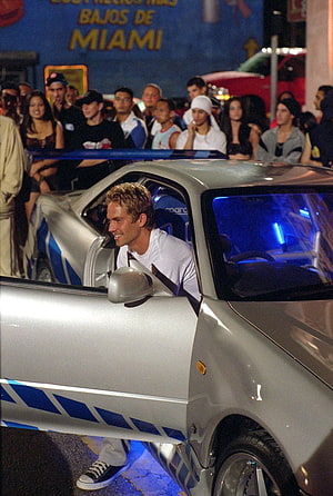 Paul Walker driving a silver modified Nissan Skyline GT-R in The Fast and the Furious movie scene HD phone wallpaper