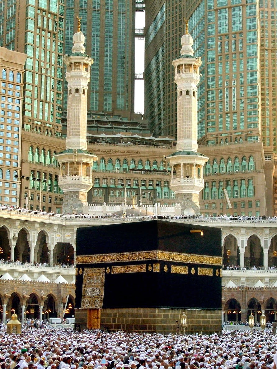 The Kaaba in Mecca Surrounded by Pilgrims and Minarets HD phone wallpaper