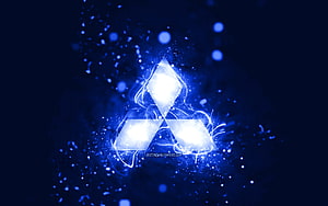 Mitsubishi Logo Glowing in Electric Blue with Neon Light Effects and Particle Sparks HD wallpaper