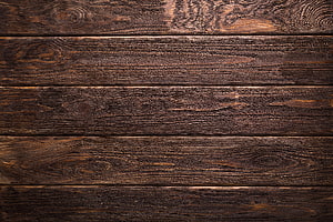 Dark rustic wooden plank texture background with natural grain patterns and knots for design HD wallpaper