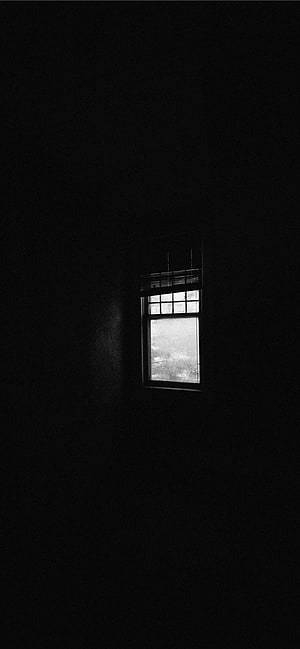 Minimalist Black and White Window in Dark Room with Soft Natural Light HD phone wallpaper