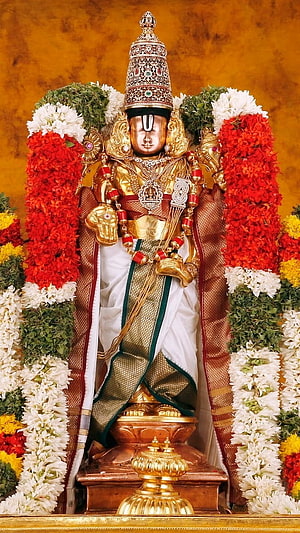 Golden Ayyappan Statue Adorned With Red And White Flower Garlands HD phone wallpaper