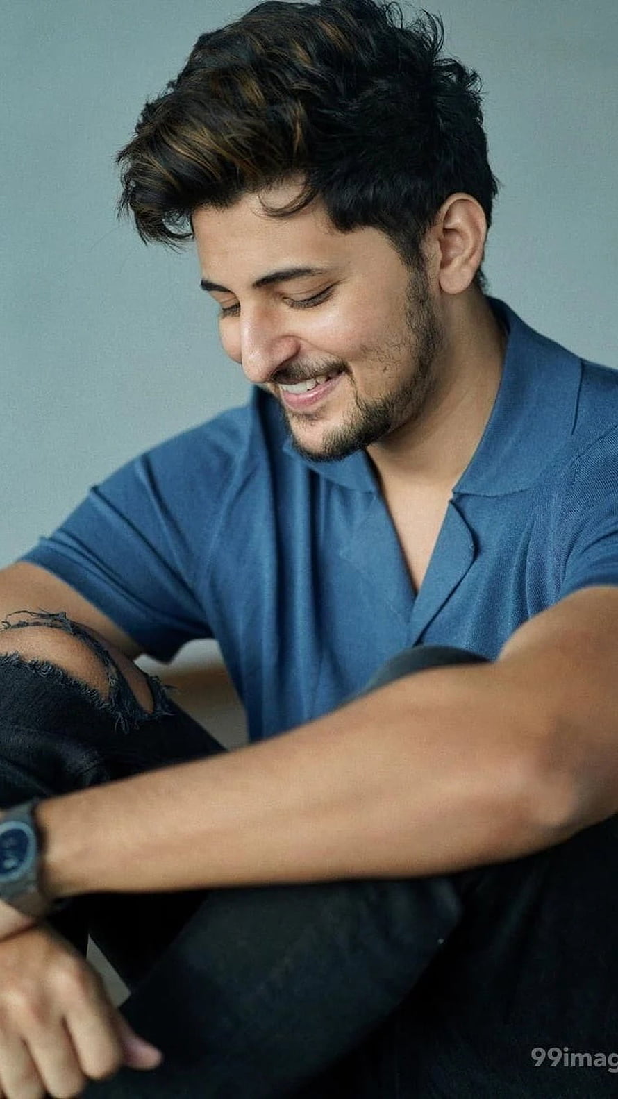 Darshan Raval smiling in a blue polo shirt with dark hair and a beard HD phone wallpaper