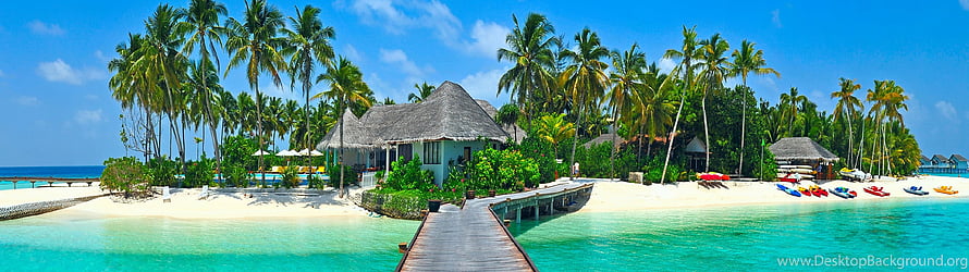 Tropical Island Resort with Thatched Villas and Wooden Boardwalk Over Turquoise Water HD wallpaper