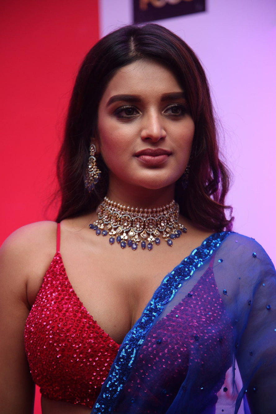 Keerthy Suresh in a stunning red sequined blouse and blue saree with heavy jewelry HD phone wallpaper