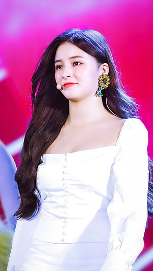 Nancy from Momoland in White Dress with Sunflower Earrings on Stage HD phone wallpaper
