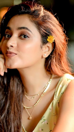 Priyanka Mohan Portrait With Flower Hair Accessory And Layered Gold Necklaces HD phone wallpaper