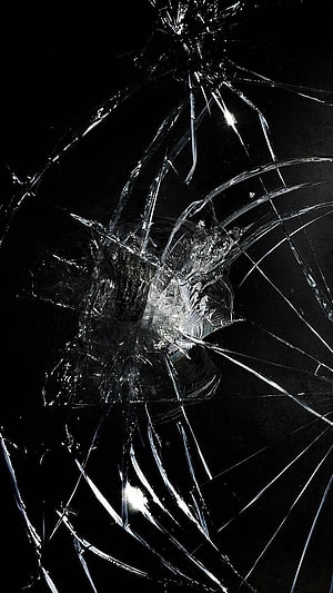 Shattered Glass Texture on Black Background with Impact Cracks HD phone wallpaper