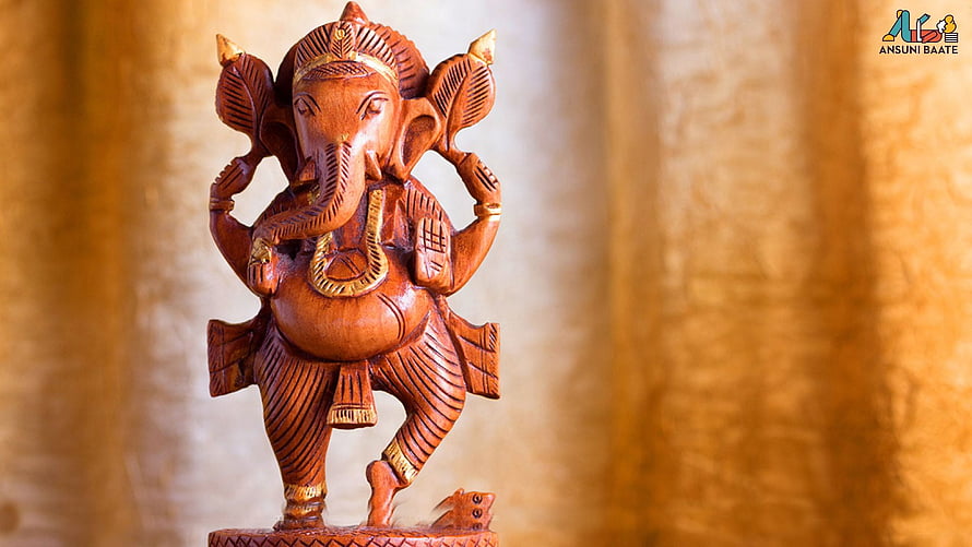 Hand-Carved Wooden Lord Ganesha Statue with Intricate Gold Accents HD wallpaper