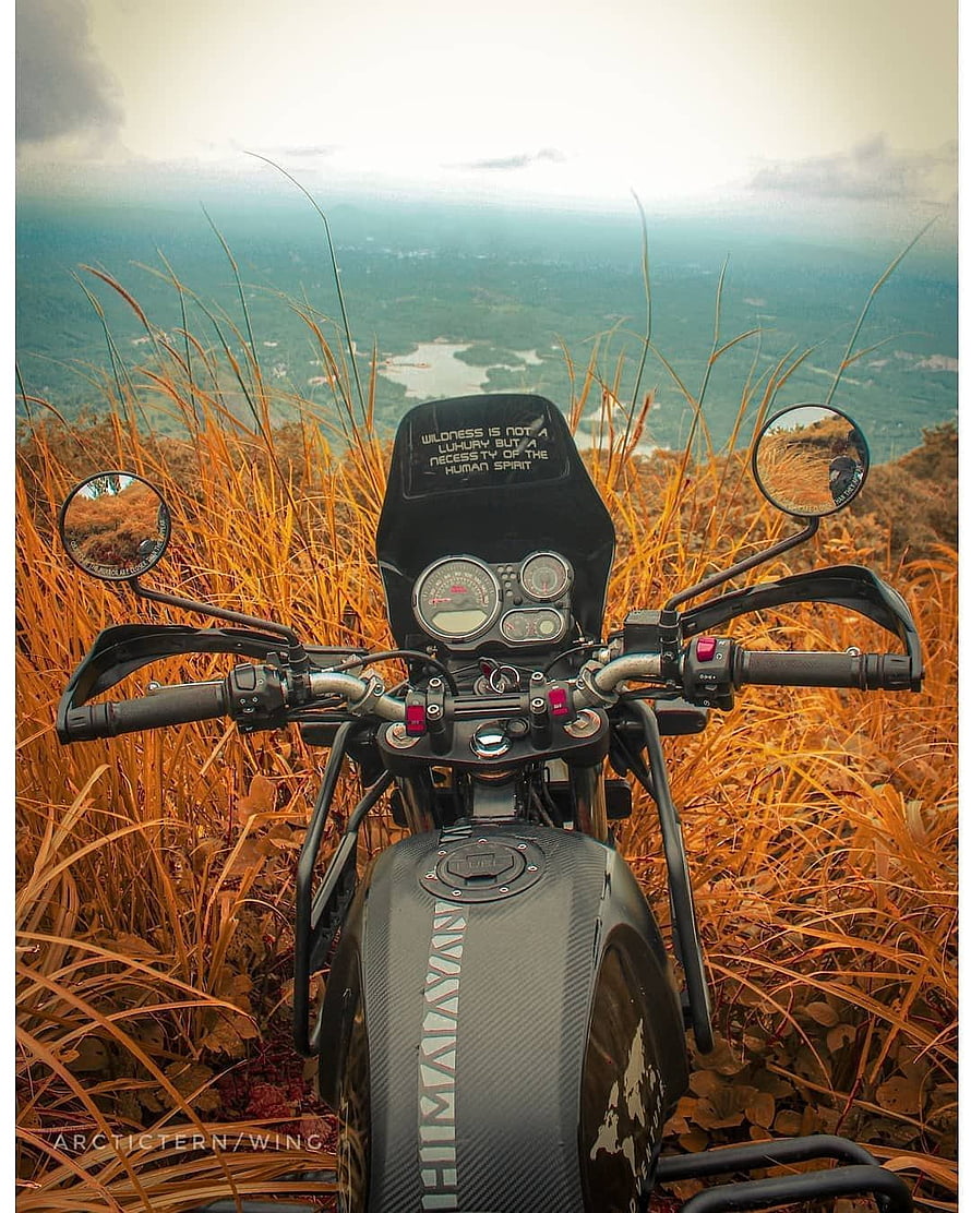 Royal Enfield Himalayan Motorcycle Parked on a Grassy Hilltop with Panoramic Valley View HD phone wallpaper