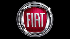 Fiat Automotive Brand Emblem with Chrome Ring and Red Shield on Black Background HD wallpaper