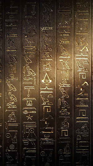Assassin's Creed Origins Egyptian Hieroglyphic Wall Carving with Golden Eye of Horus Symbol HD phone wallpaper