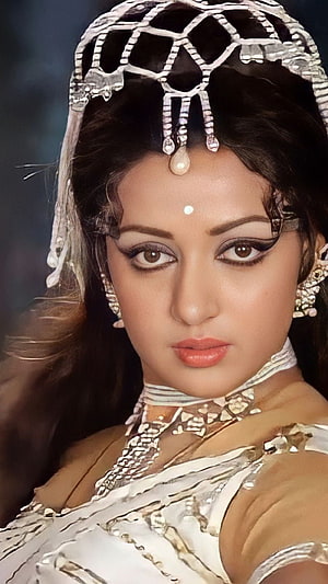 Hema Malini in ornate silver headpiece and traditional Indian costume HD phone wallpaper