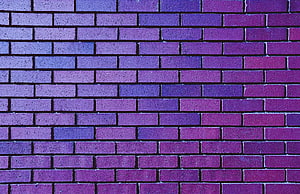 Violet and Purple Brick Wall Texture with Gradient Color Shift HD wallpaper