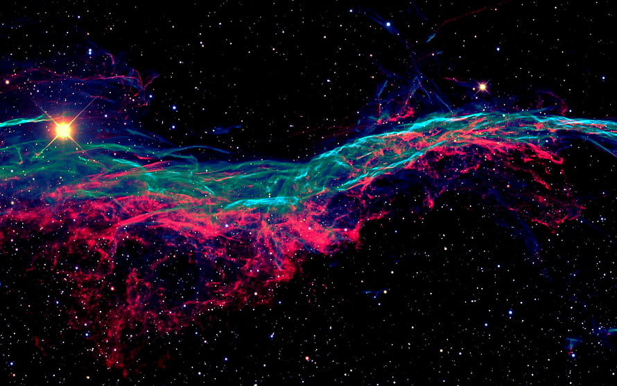 Vibrant Cosmic Nebula with Red and Cyan Gas Clouds Against a Starry Black Sky HD wallpaper