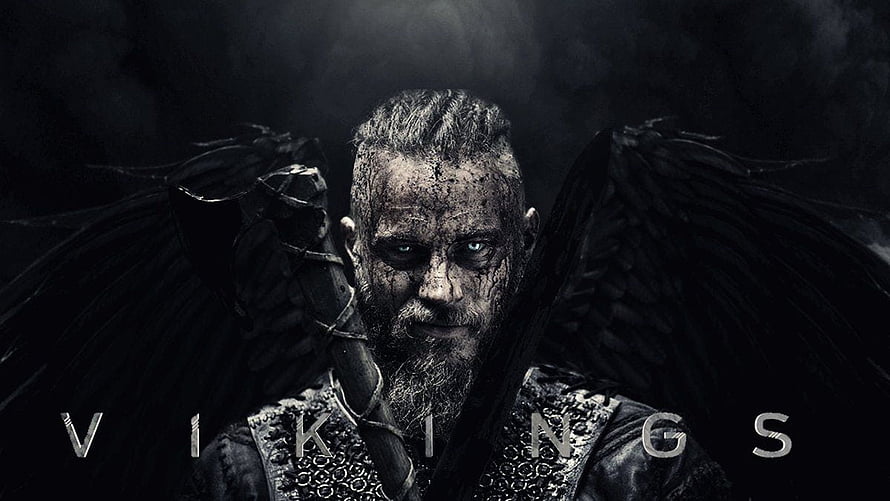 Ragnar Lothbrok from Vikings with dark wings and battle-worn face in moody cinematic portrait HD wallpaper
