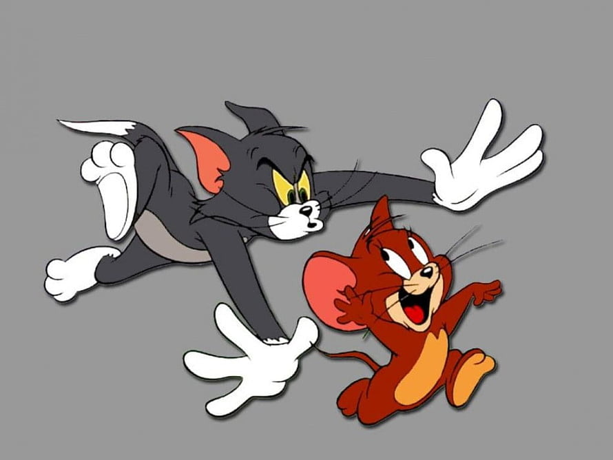 Tom and Jerry Classic Cartoon Characters in Dynamic Chase Pose on Gray Background HD wallpaper