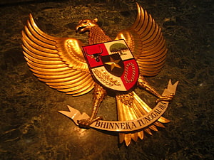 Golden Garuda Pancasila National Emblem of Indonesia on Dark Marble Background HD wallpaper