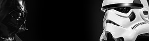 Darth Vader and Stormtrooper Helmet Close-Up on Black Background HD wallpaper