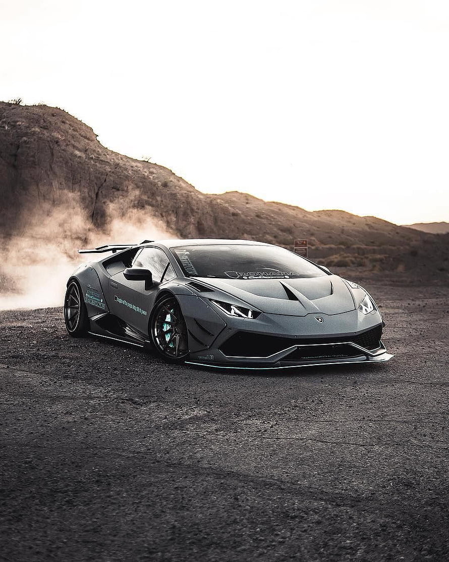 Liberty Walk Lamborghini Huracan Widebody in Matte Grey on Desert Terrain HD phone wallpaper