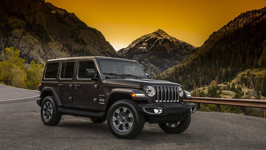 Black Jeep Wrangler Unlimited Parked on Mountain Road at Golden Hour HD wallpaper