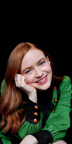 Sadie Sink Portrait in Green Textured Dress with Red Hair and Black Background HD phone wallpaper