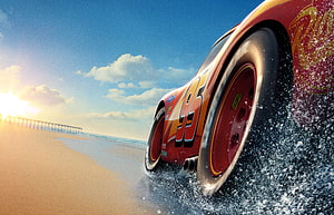 Lightning McQueen Racing on the Beach in Cars 3 HD wallpaper