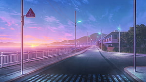 Serene Coastal Road at Sunset with Vibrant Purple and Pink Sky HD wallpaper