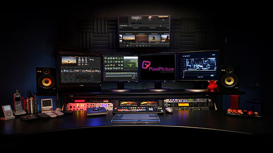 Professional Video Editing Studio Setup with Multiple Monitors and Audio Equipment HD wallpaper