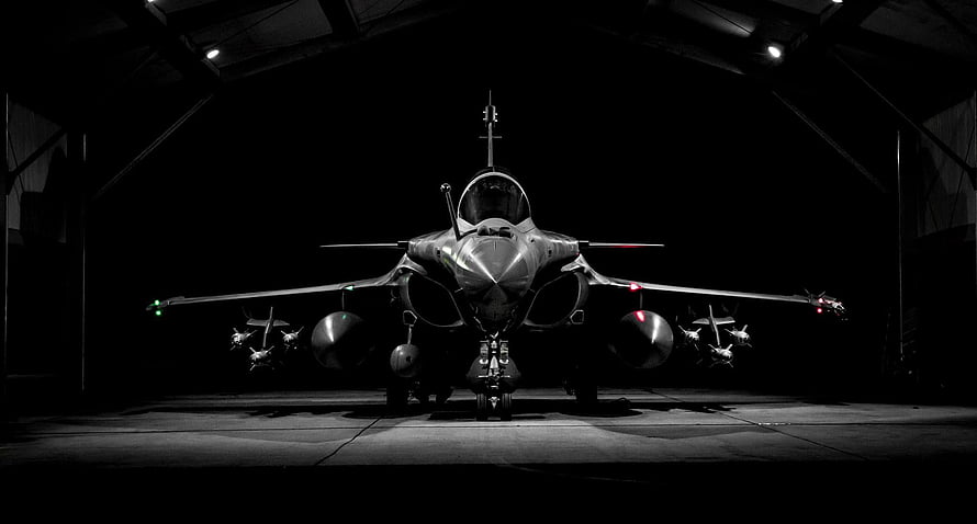 Front View of Eurofighter Typhoon Fighter Jet in Dark Hangar HD wallpaper