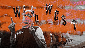 Central Cee Wild West Album Artwork with Orange Grunge Texture and Gothic Typography HD wallpaper