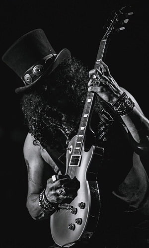 Black and white portrait of a rock musician with a top hat playing an electric guitar HD phone wallpaper